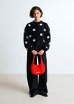 Lala mesure 1m74 et porte le cardigan en taille 1.