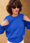 Naomi mesure 1m70 et porte une taille XS.
