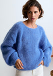 Lala mesure 1m74 et porte une taille S.
