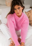 Jeanne mesure 1,68m et porte une taille 2