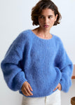 Lala mesure 1m74 et porte une taille S.