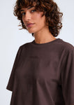 Naomi mesure 1m70 et porte une taille XS.