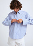 Naomi mesure 1m70 et porte une taille S/M