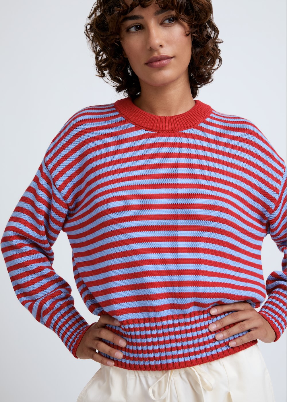 Naomi mesure 1m70 et porte une taille XS.