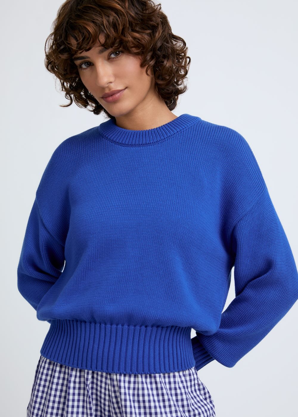 Naomi mesure 1m70 et porte une taille XS.