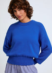 Naomi mesure 1m70 et porte une taille XS.