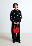 Lala mesure 1m74 et porte le cardigan en taille 1.