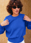 Naomi mesure 1m70 et porte une taille XS.