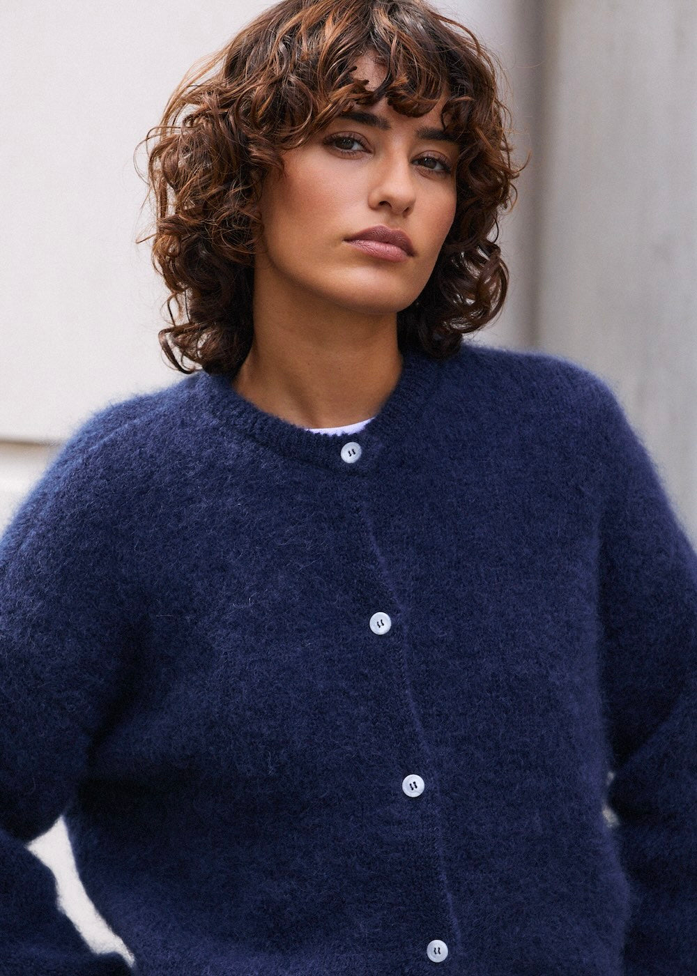 Naomi mesure 1m70 et porte une taille 2.