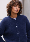 Naomi mesure 1m70 et porte une taille 2.