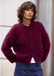 Naomi mesure 1m70 et porte une taille 2