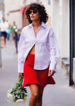 Naomi mesure 1m70 et porte une taille S/M
