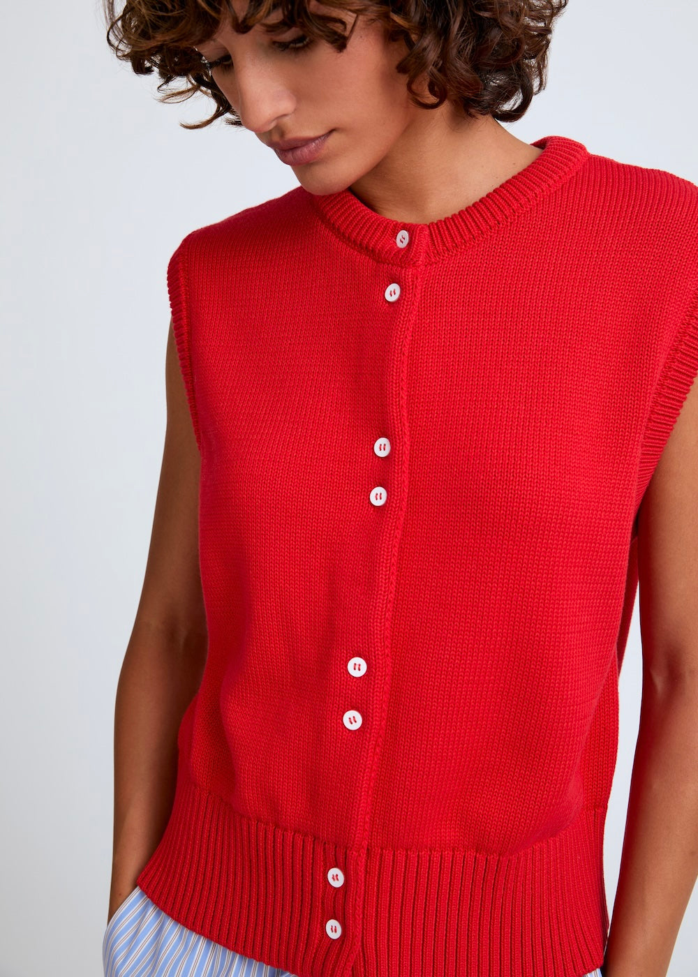 Naomi mesure 1m70 et porte une taille XS.