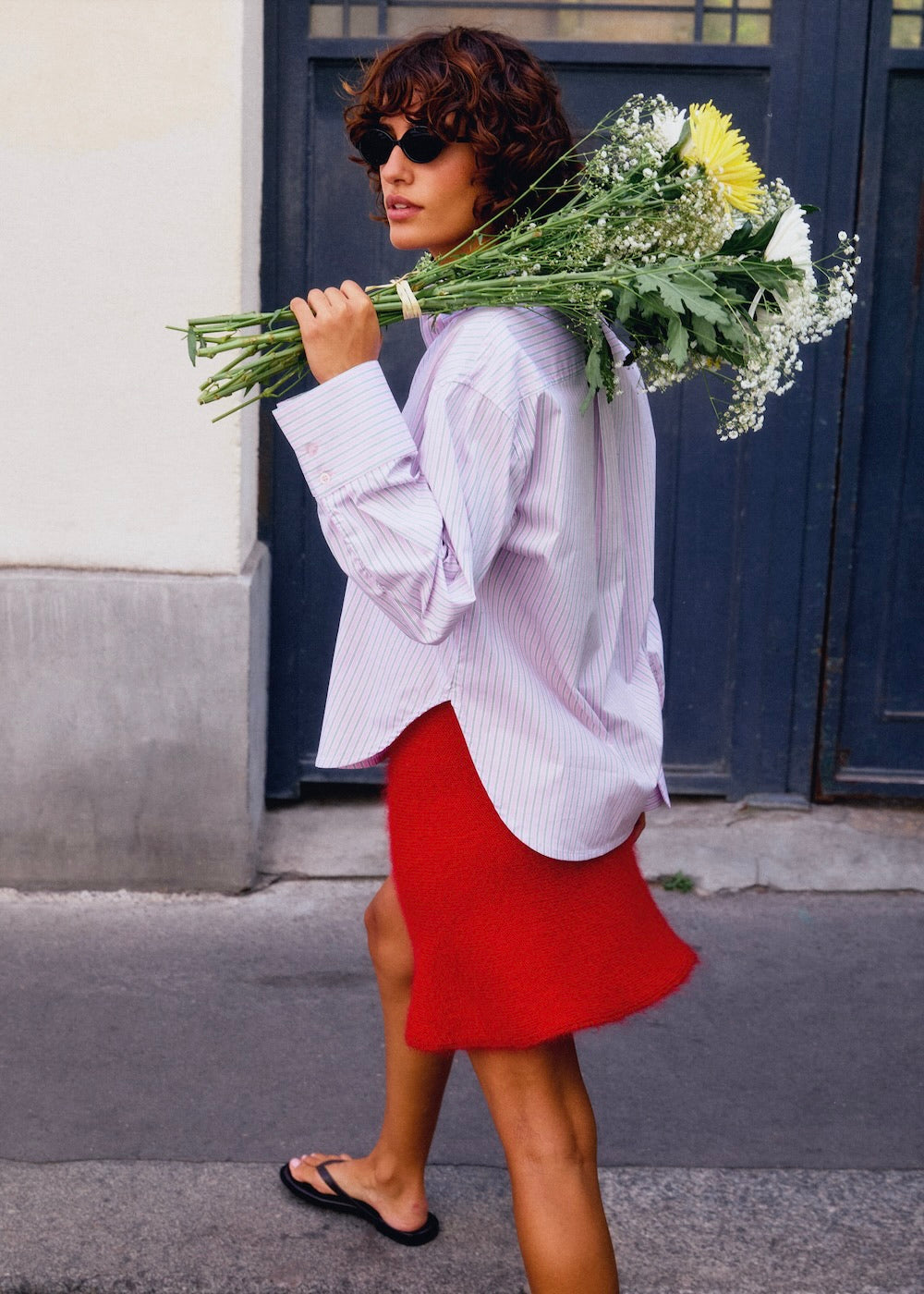 Naomi mesure 1m70 et porte une taille S/M