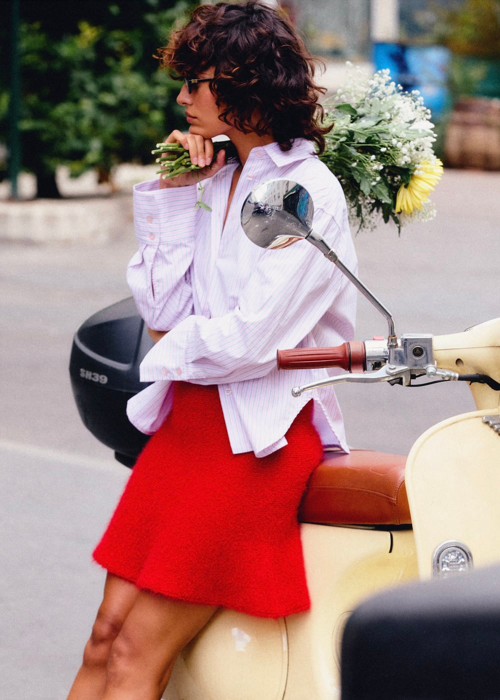 Naomi mesure 1m70 et porte une taille S/M