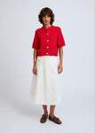 Naomi mesure 1m70 et porte une taille XS/S.