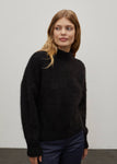 Irene mesure 1,70m et porte une taille 2