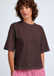 Naomi mesure 1m70 et porte une taille XS.
