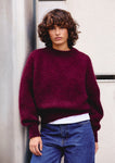 Naomi mesure 1m70 et porte une taille 2