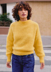 Naomi mesure 1m70 et porte une taille 2