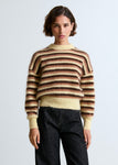 Lala mesure 1m74 et porte une taille XS.