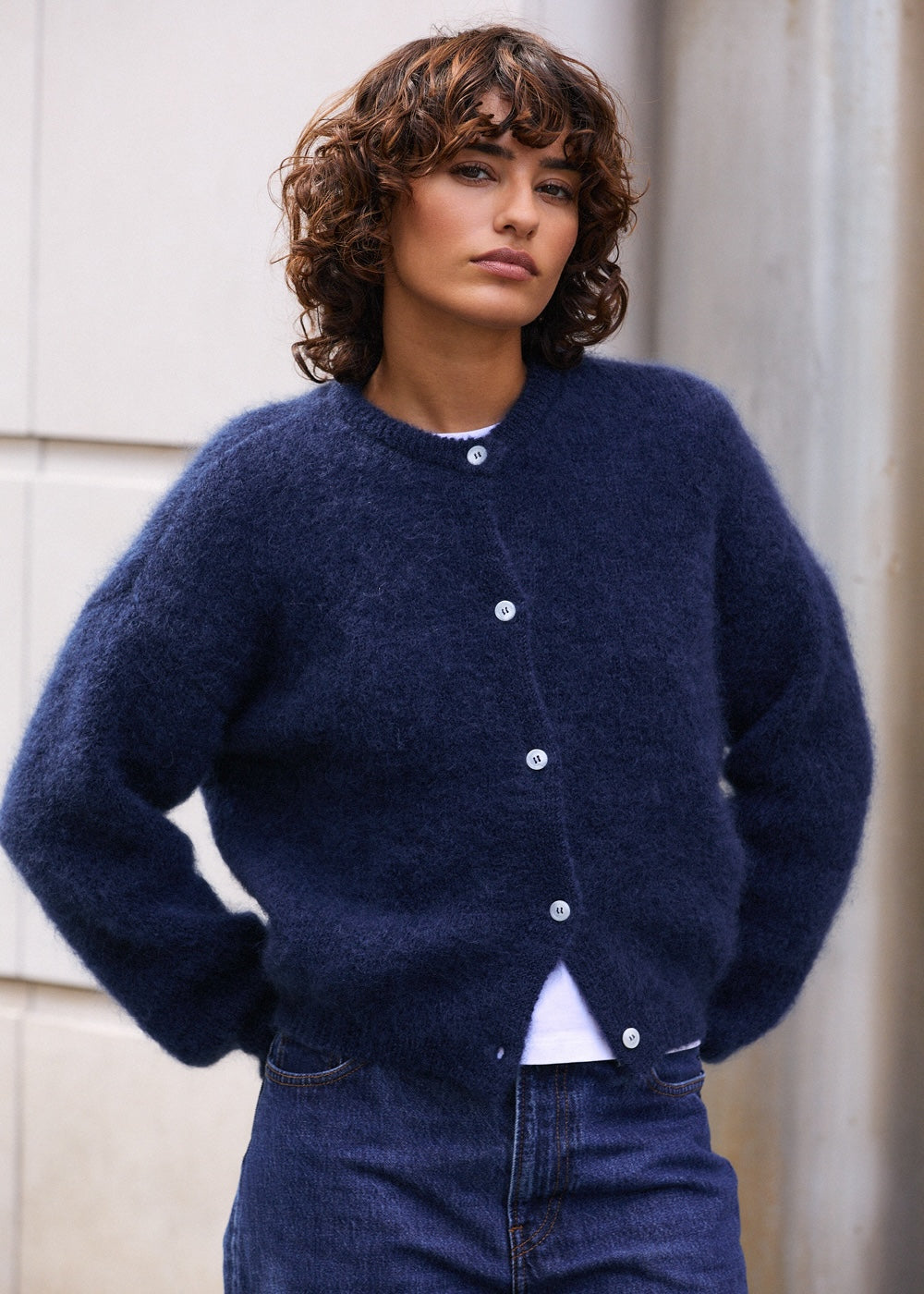 Naomi mesure 1m70 et porte une taille 2