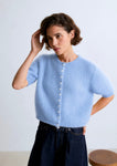 Lala mesure 1m74 et porte une taille S.