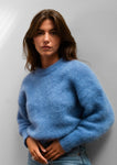 Jeanne mesure 1,68m et porte une taille 2