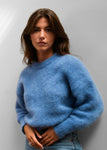 Jeanne mesure 1,68m et porte une taille 2