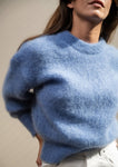 Jeanne mesure 1,68m et porte une taille 2